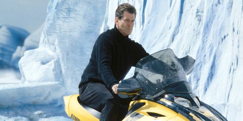 Pierce Brosnan, as James Bond, rides a snowmobile in Die Another Day.