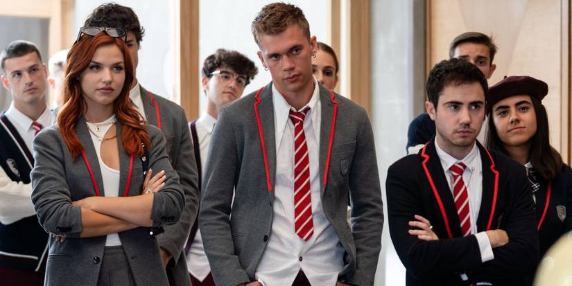 The cast of Elite Season 8 in school uniforms looking angsty. 