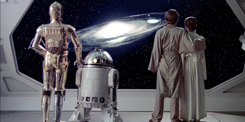The final shot of 'Star Wars: The Empire Strikes Back' with the cast looking out a window toward a galaxy.