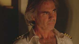 Frank Lapidus (played by Jeff Fahey), narrows his eyes in concern in one of the Dharma cabins in Lost’s Season 5 Episode Dead is Dead.