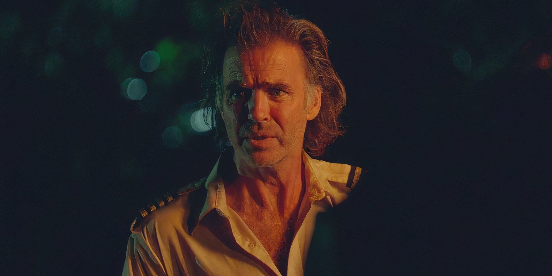 Frank Lapidus (played by Jeff Fahey), looks alarmed, illuminated by torchlight in Lost’s Season 6 Episode ‘Everybody Loves Hugo.’
