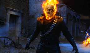 A flaming Ghost Rider wanders through an abandoned churchyard in Ghost Rider.
