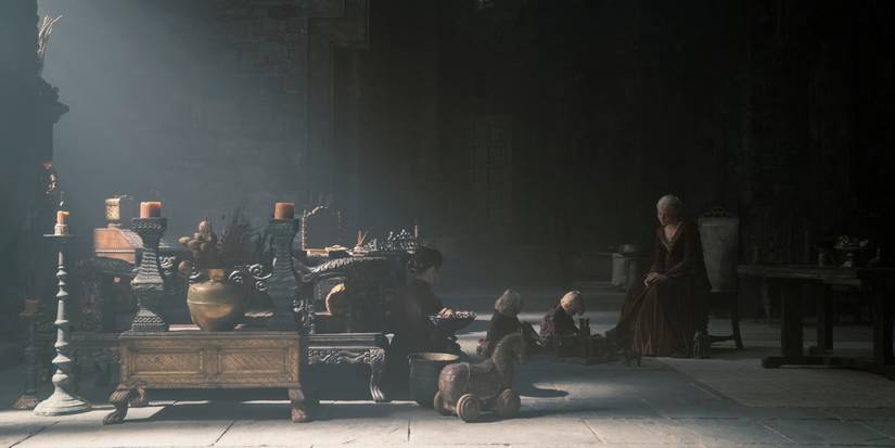 Emma D'Arcy sitting with Rhaenyra's children in House of the Dragon Season 2 Episode 2