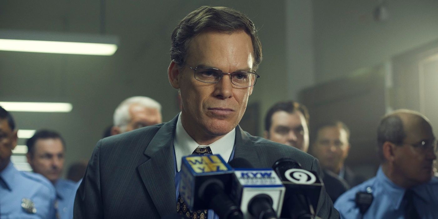 Michael C. Hall as Holt giving a press conference in In The Shadow of the Moon