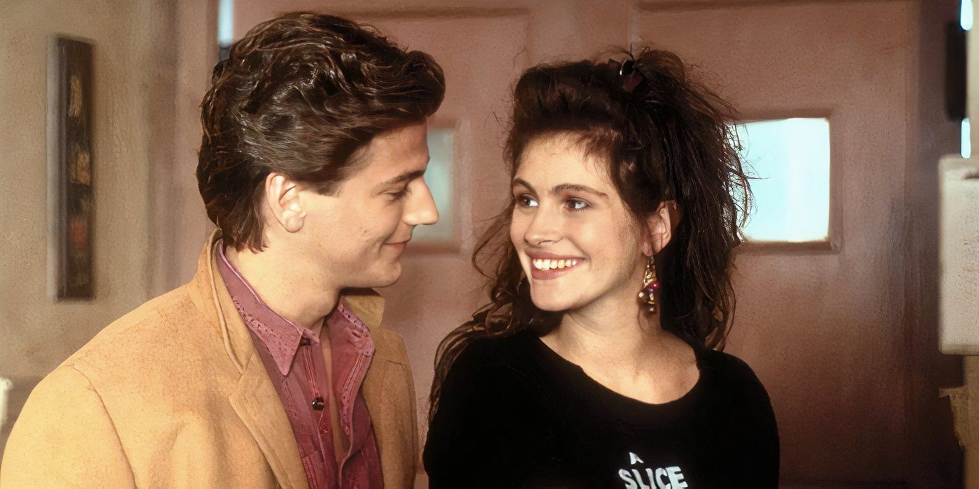 Julia Roberts as Daisy and Adam Storke as Charlie smile and look at each other in Mystic Pizza 1988