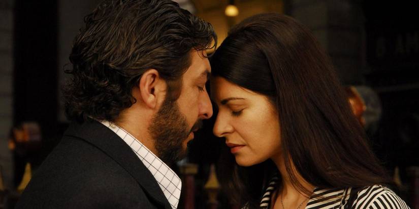 Ricardo Darin and Soledad Villamil embrace as Esposito and Irene in The Secret in THeir Eyes