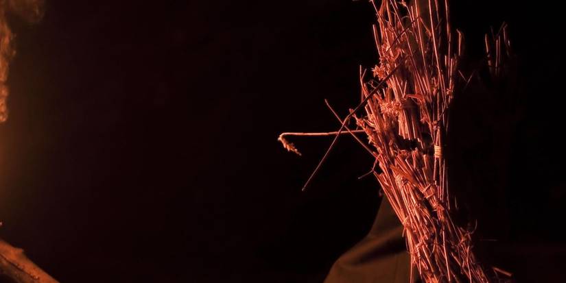 A cult member in Kill List wearing a straw mask