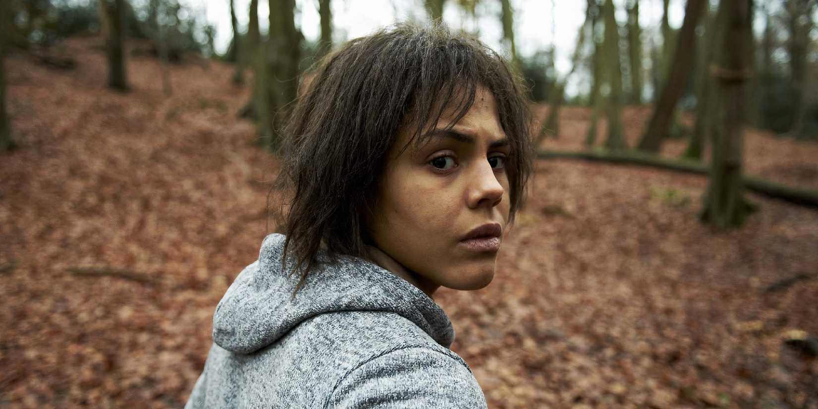 Lenora Crichlow as Victoria in Black Mirror White Bear looking back.
