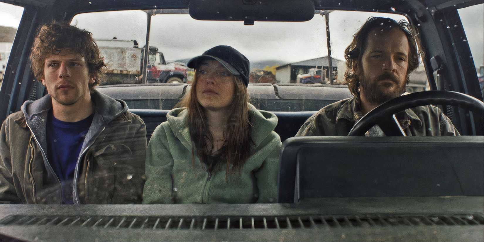 Jesse Eisenberg, Dakota Fanning, and Peter Sarsgaard riding in a truck in Night Moves.