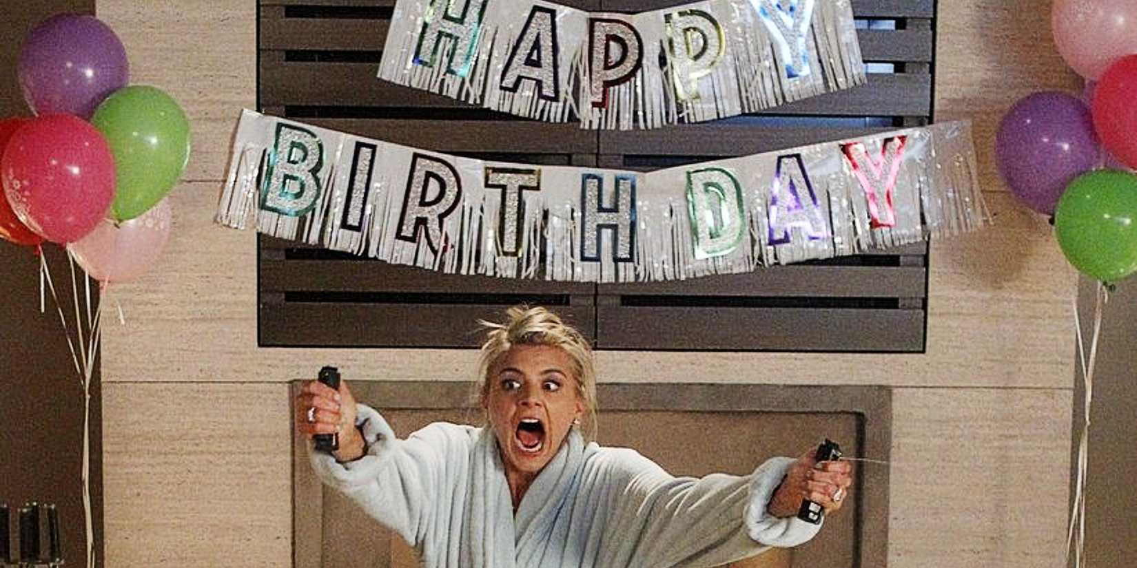 Jane Kerkovich-Williams spraying pepperspray in front of a HAPPY BIRTHDAY banner in Happy Endings