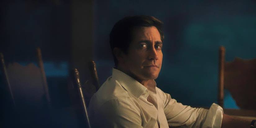 Jake Gyllenhaal looks sad sitting at a table in Presumed Innocent, Episode 1