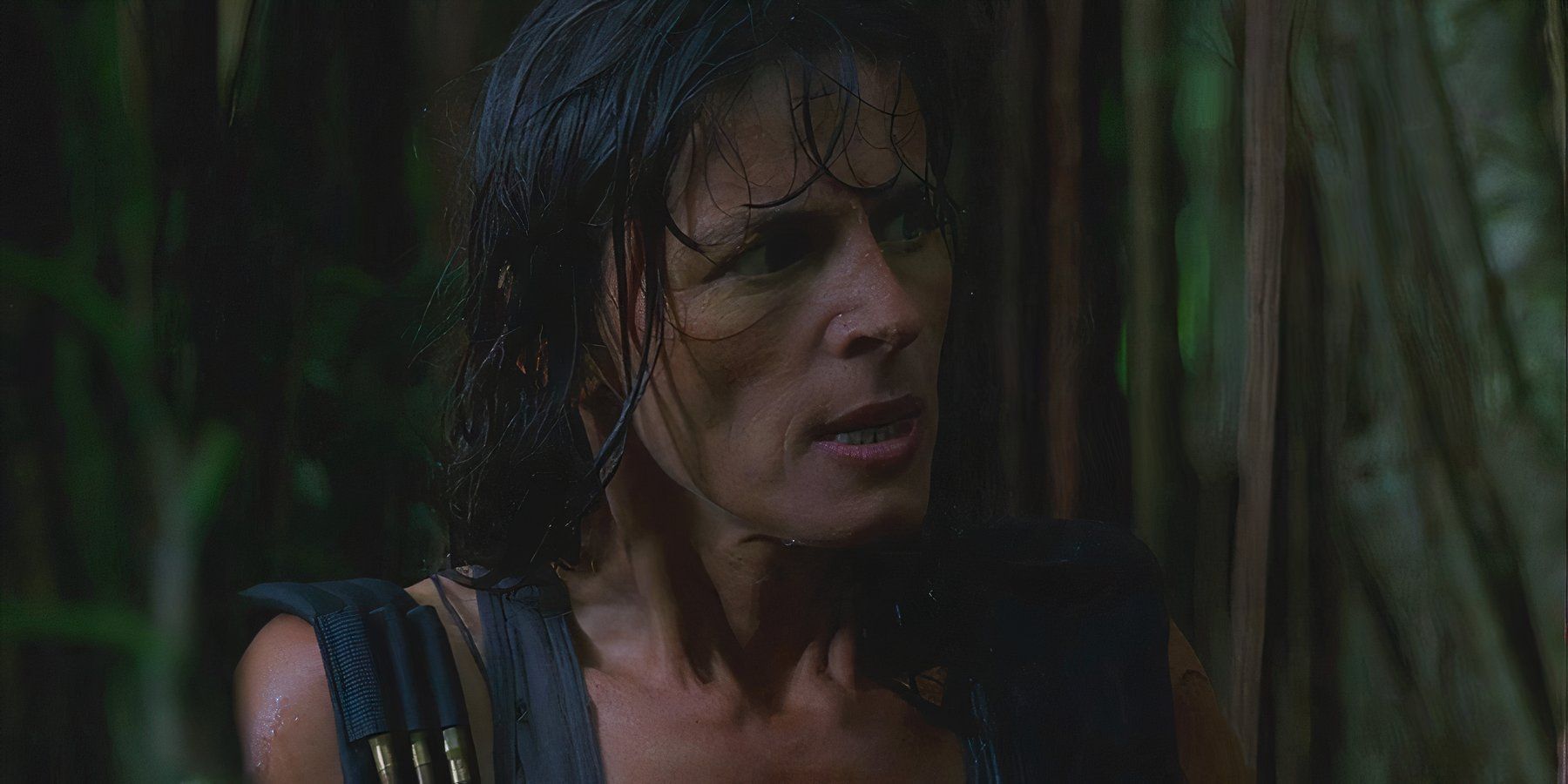 Danielle Rousseau (played by Mira Furlan), soaked from the rain, advises the survivors on how to avoid the Monster in Lost’s Season 1 Episode ‘Exodus.’