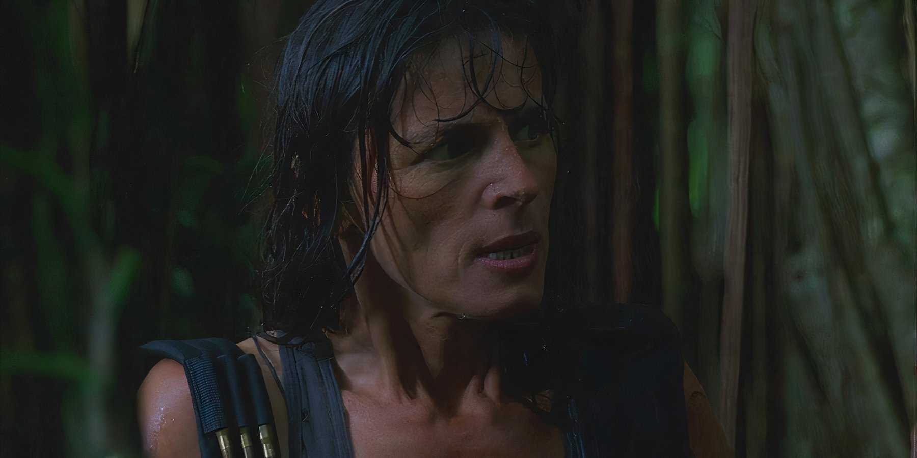 Danielle Rousseau (played by Mira Furlan), soaked from the rain, advises the survivors on how to avoid the Monster in Lost’s Season 1 Episode ‘Exodus.’