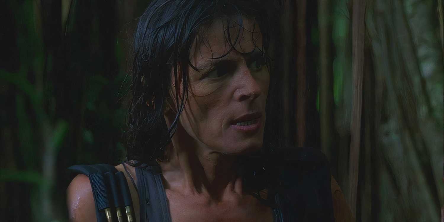Danielle Rousseau (played by Mira Furlan), soaked from the rain, advises the survivors on how to avoid the Monster in Lost’s Season 1 Episode ‘Exodus.’