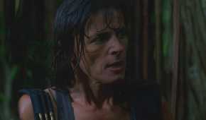 Danielle Rousseau (played by Mira Furlan), soaked from the rain, advises the survivors on how to avoid the Monster in Lost’s Season 1 Episode ‘Exodus.’