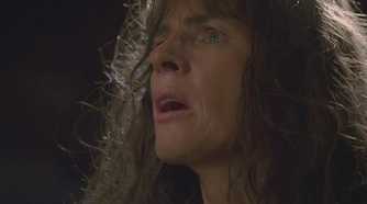 Danielle Rousseau (played by Mira Furlan), stares into space, recalling how she heard whispers in the jungle in Lost’s Season 1 Episode ‘Solitary.’