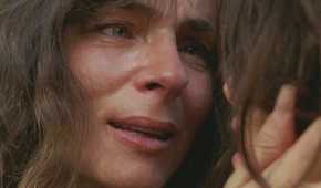 Reunited with her daughter Alex (Tania Raymonde), Danielle Rousseau (Mira Furlan), hides from gunfire in Lost’s Season 4 Episode ‘Meet Kevin Johnson.’