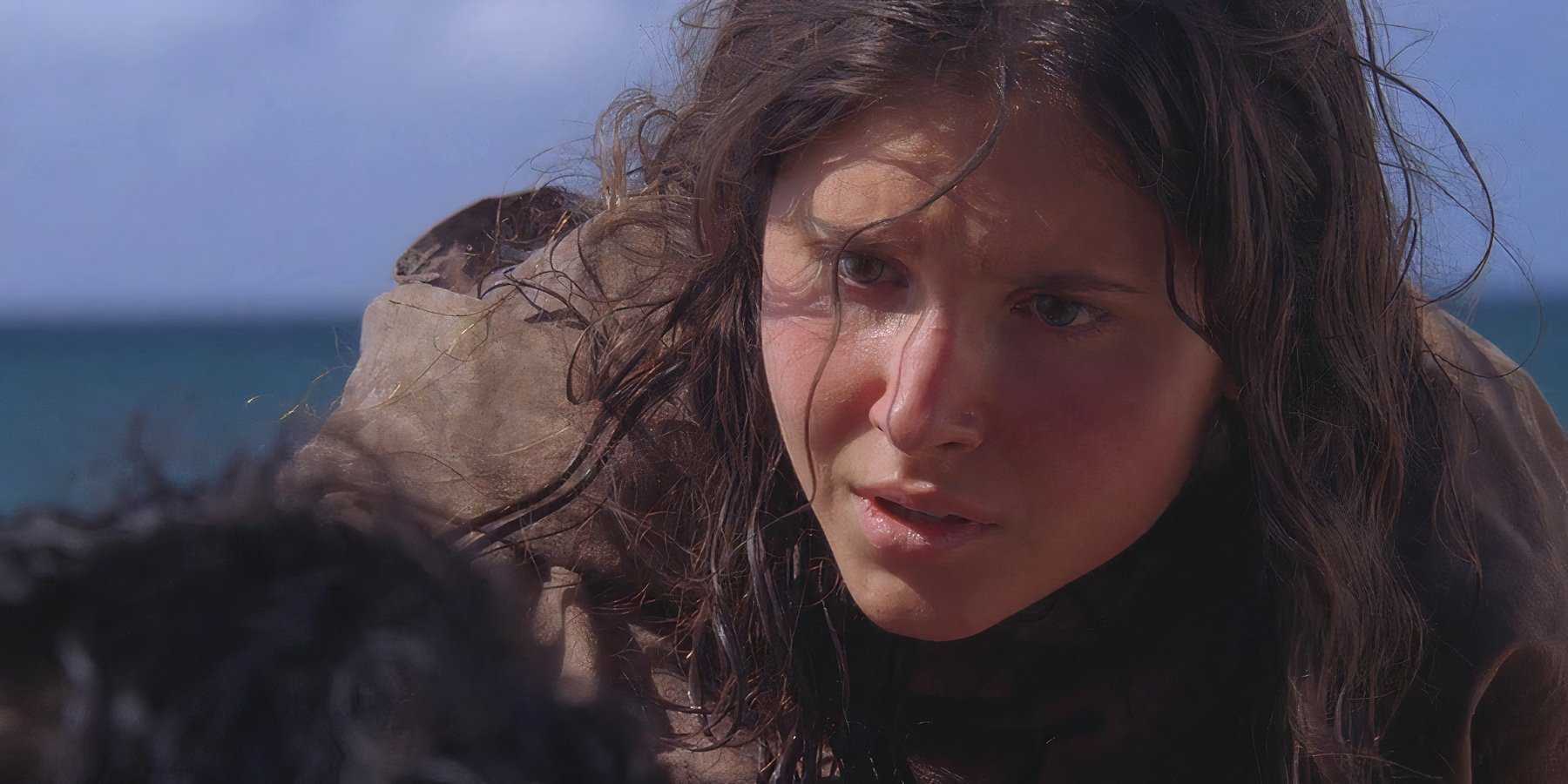 Young Danielle Rousseau (played by Melissa Farman), kneels to speak with Jin (Daniel Dae Kim), on the Island in Lost’s Season 5 Episode ‘The Little Prince.’