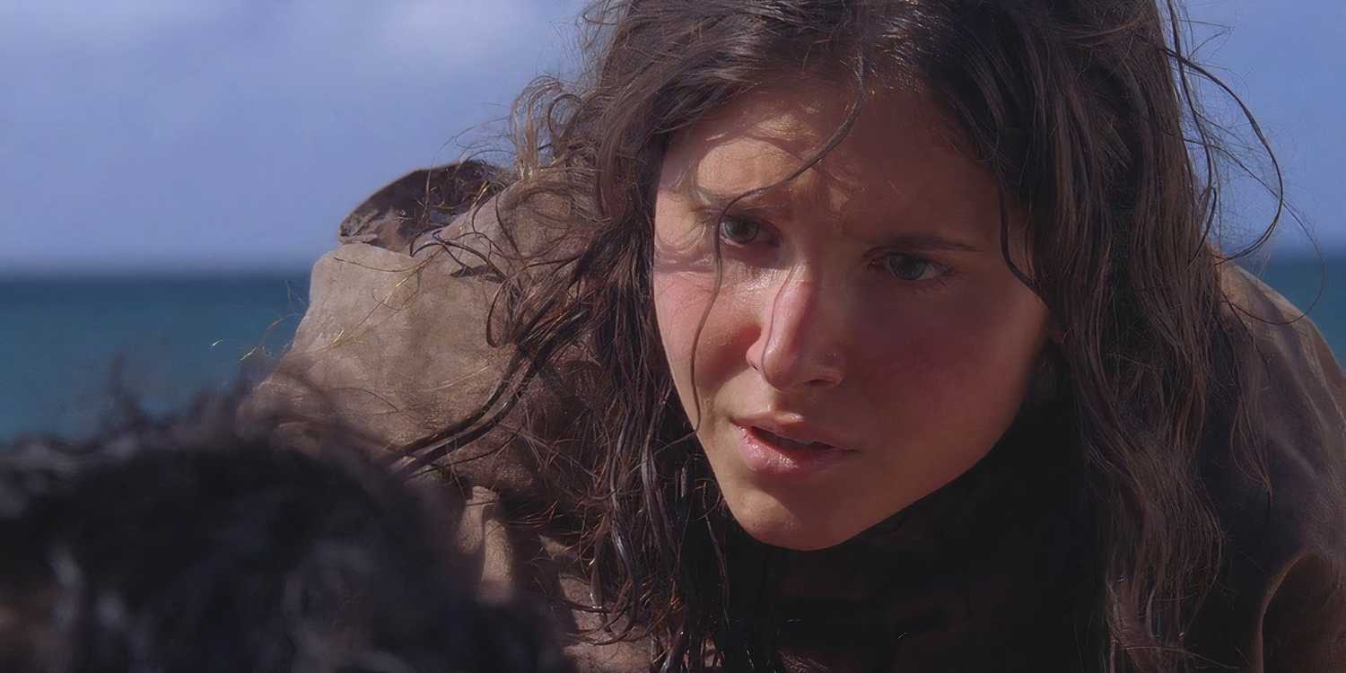 Young Danielle Rousseau (played by Melissa Farman), kneels to speak with Jin (Daniel Dae Kim), on the Island in Lost’s Season 5 Episode ‘The Little Prince.’