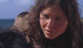 Young Danielle Rousseau (played by Melissa Farman), kneels to speak with Jin (Daniel Dae Kim), on the Island in Lost’s Season 5 Episode ‘The Little Prince.’