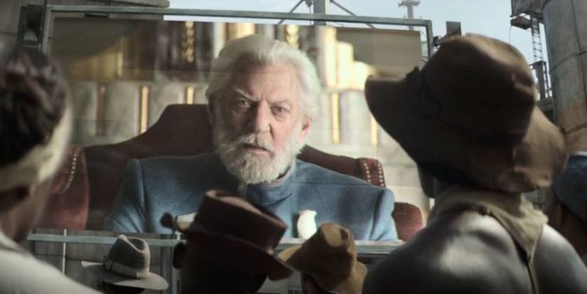 President Snow (Donald Sutherland) threatens the Districts in Mockingjay Part 1 (2014). 