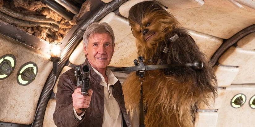 Harrison Ford's Han Solo smiling with Peter Mayhew's Chewbacca in Star Wars: The Force Awakens. 