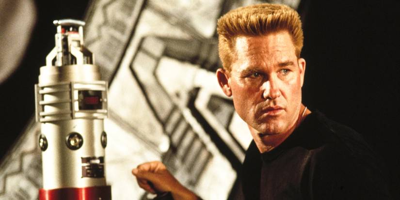 Kurt Russell's Jack looking concerned near space tech in Stargate 