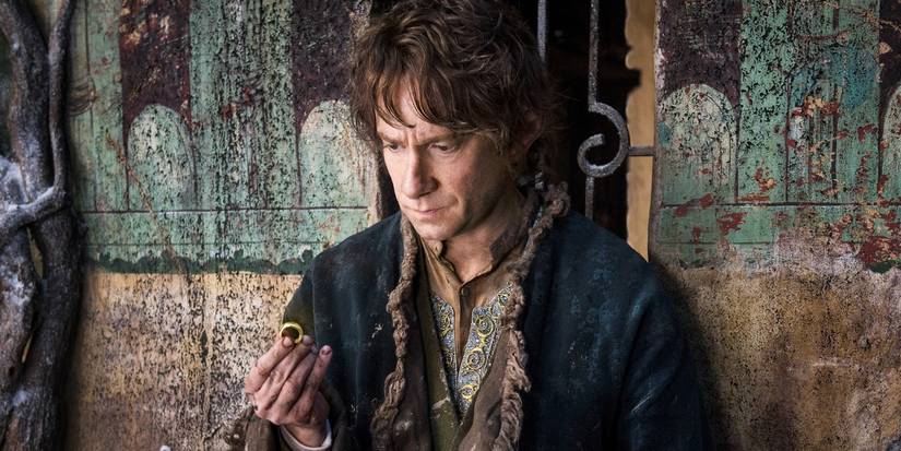 Martin Freeman as Bilbo Baggins looking at the ring in The Hobbit: The Battle of the Five Armies 
