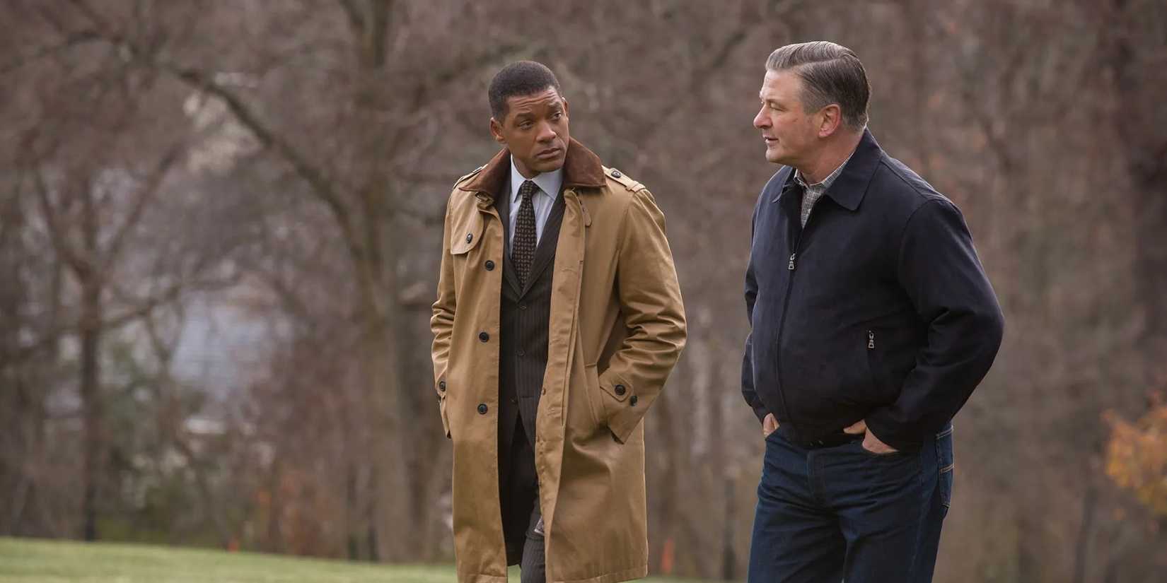 Bennet Omalu walking with Julian in Concussion