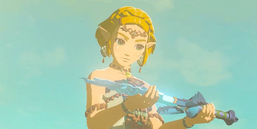 Zelda holding the broken Master Sword in 'The Legend of Zelda Tears of the Kingdom.'