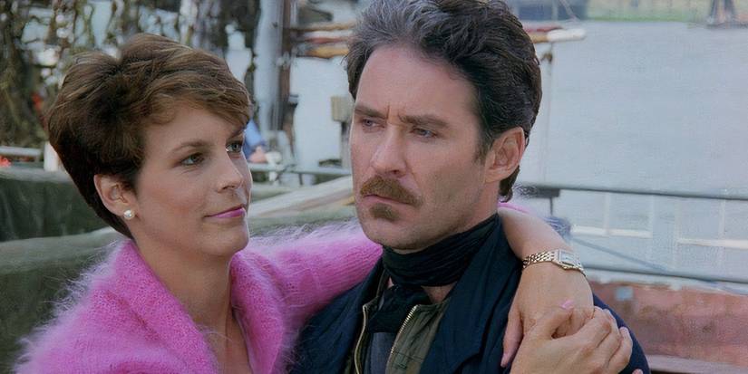 Wanda (Jamie Lee Curtis, left) embraces otto (Kevin Kilhe, right) in 'A Fish called Wanda'