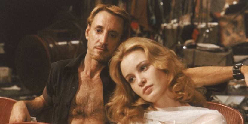 Roy Scheider's Joe Gideon with his arm around Jessica Lange's Angelique in All That Jazz