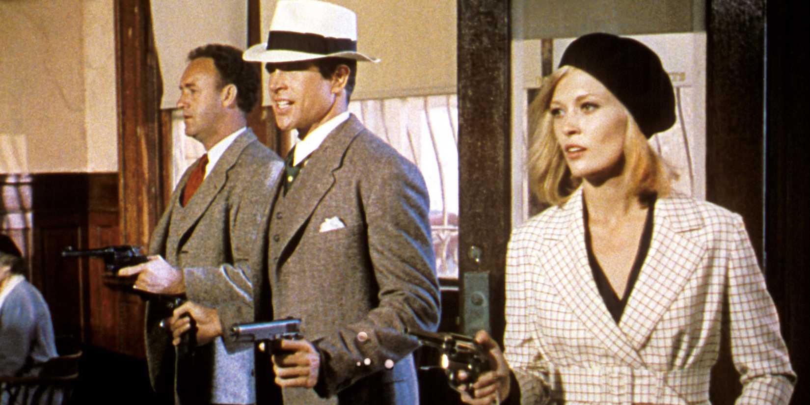 Gene Hackman, Warren Beatty, and Faye Dunaway robbing a bank as the characters in Bonnie and Clyde (1967)