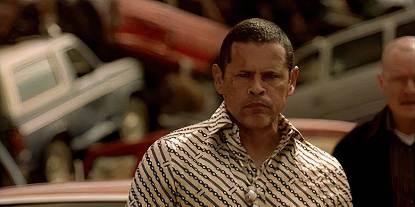 Tuco Salamanca from Breaking Bad looking angry, blood on his face.