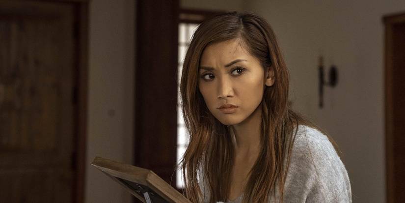 Brenda Song, looking at something suspiciously, as Jennifer in Secret Obsession