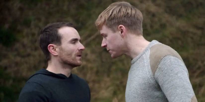 Jack Lowden as Vaughn and Martin McCann as Marcus having an argument in the woods in Calibre 