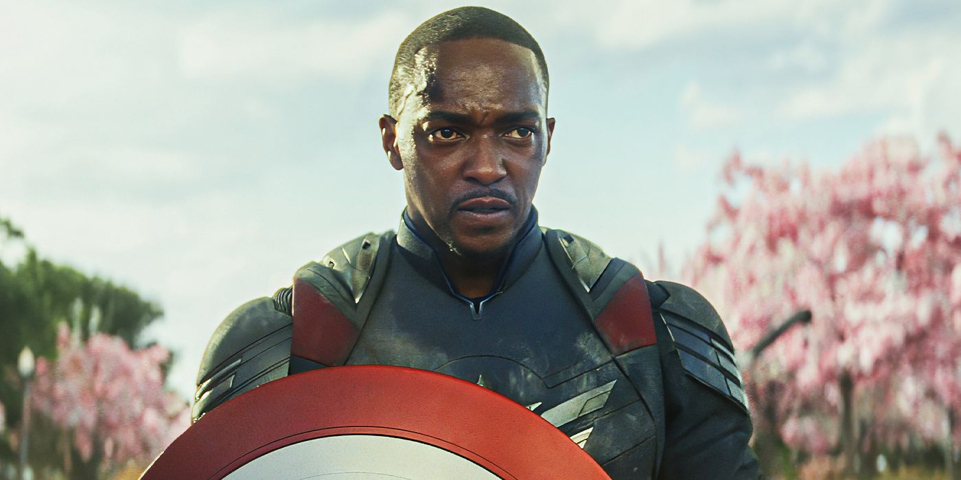 Anthony Mackie as Captain America, holding his shield and looking intent in Brave New World.