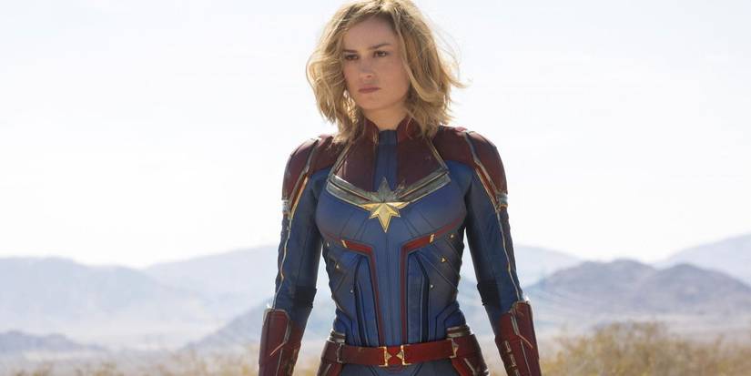 Captain Marvel Brie Larson standing alone in the desert in Captain Marvel.