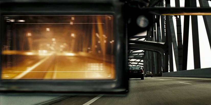 Denzel Washington's display of the past and his view of the road in front of him during the dual-timeline car chase in Tony Scott's 'Deja Vu'