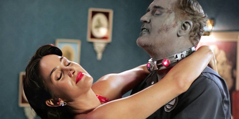 Carrie-Anne Moss and Billy Connolly dancing in Fido.