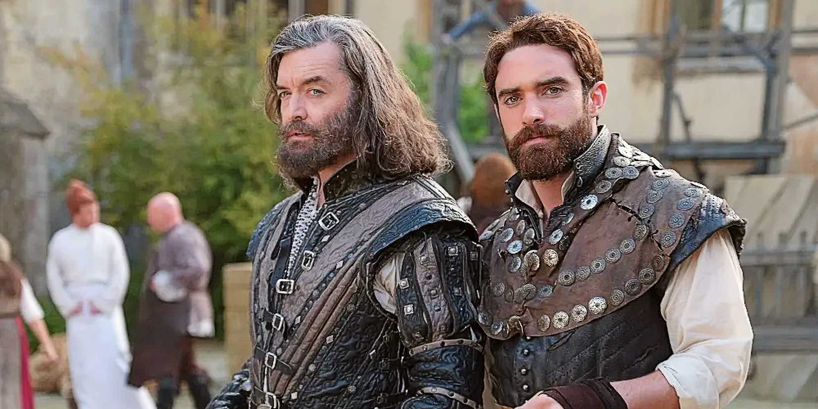 King Richard and Galavant stand together, dressed in armor, with smolder looks on their faces, in Galavant