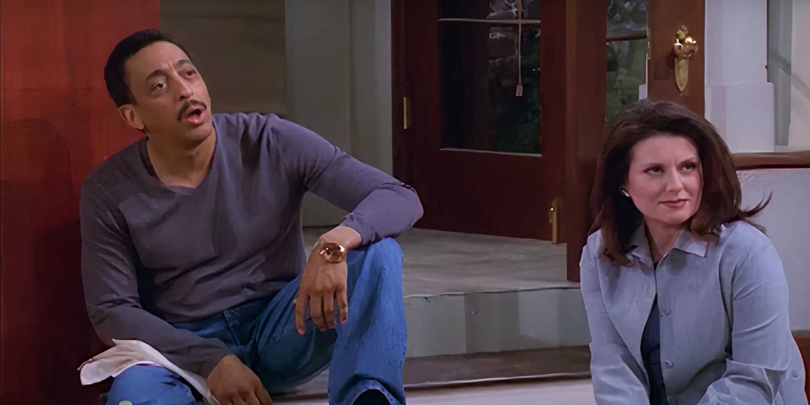 Gregory Hines sitting with Megan Mullally in Will & Grace