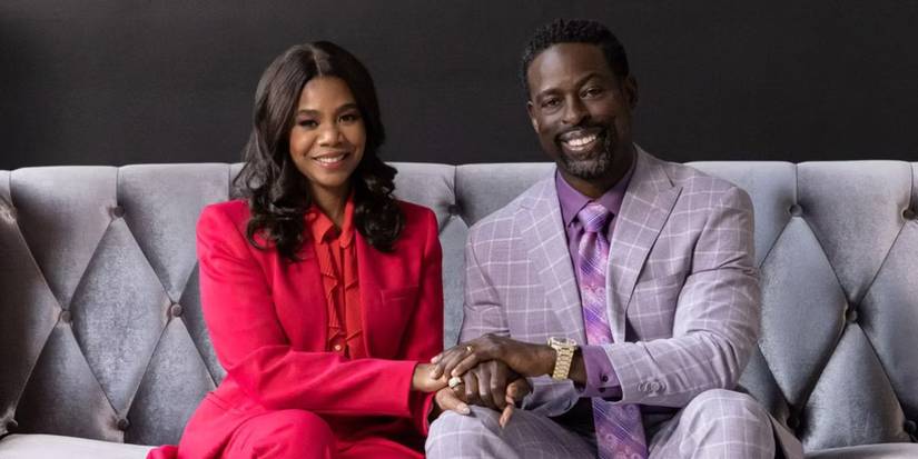 Regina Hall and Sterling K Brown sit on a couch for a promo shot of Honk For Jesus. Save Your Soul.