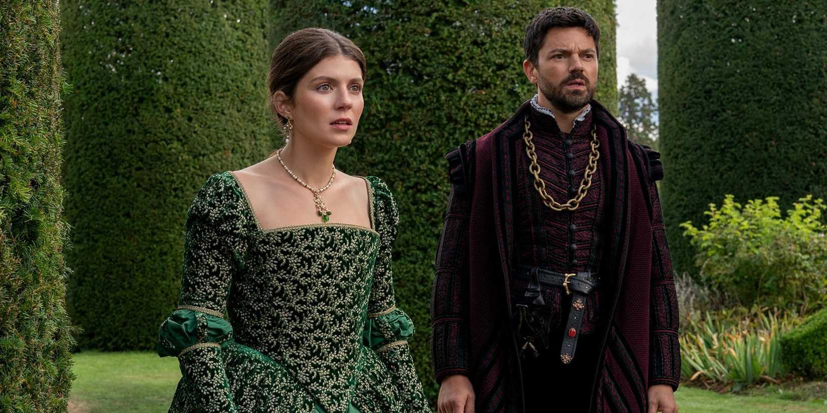 Jane and Seymour looking shocked in the garden in My Lady Jane