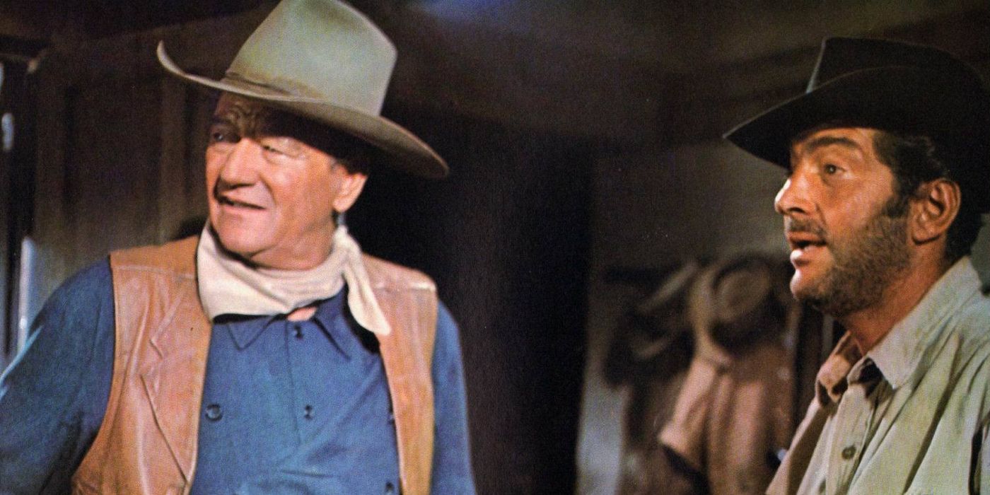 John Wayne and Dean Martin staring off screen in The Sons of Katie Elder