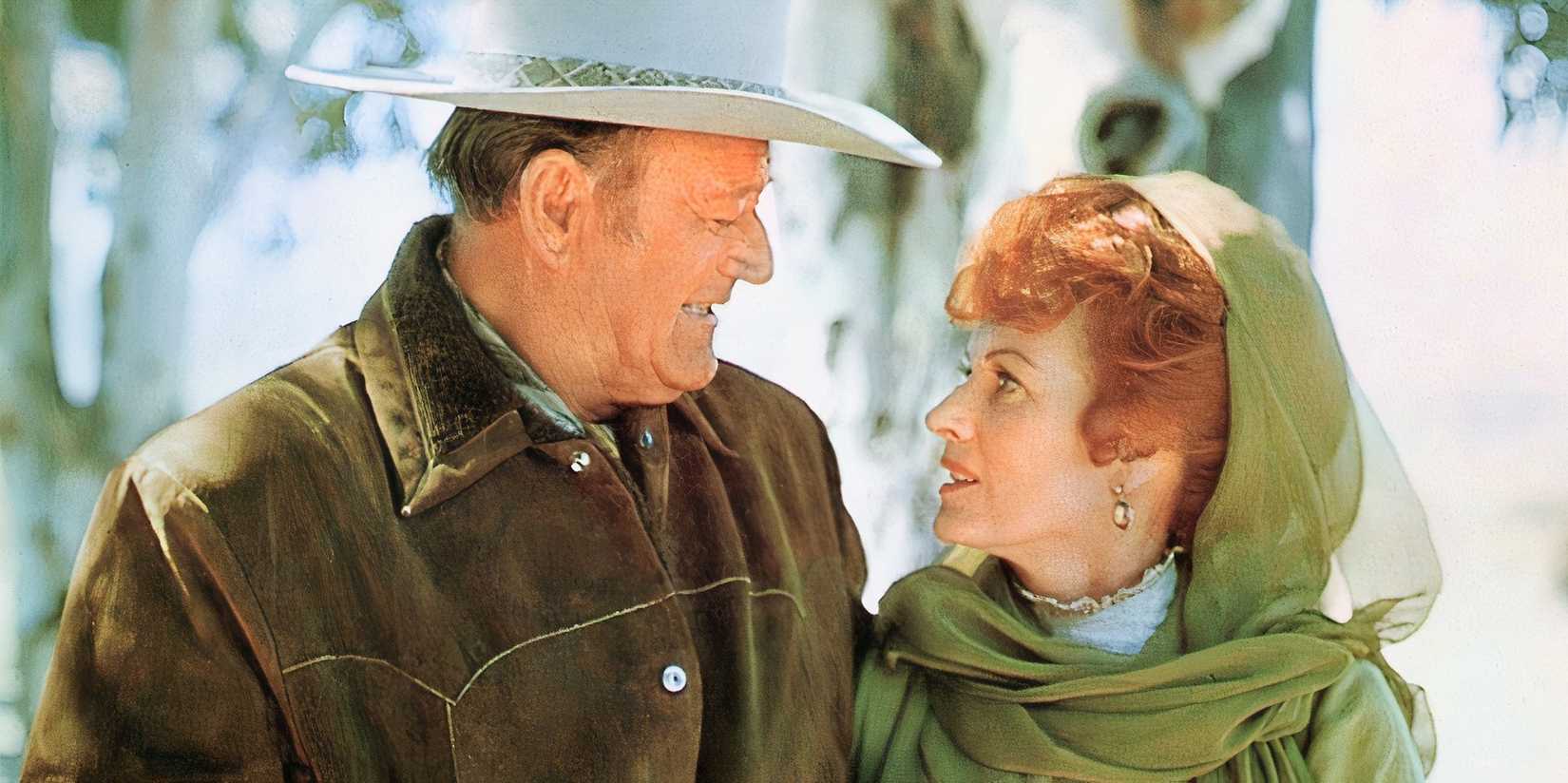 John Wayne and Maureen O'Hara looking at each other in Big Jake (1971)