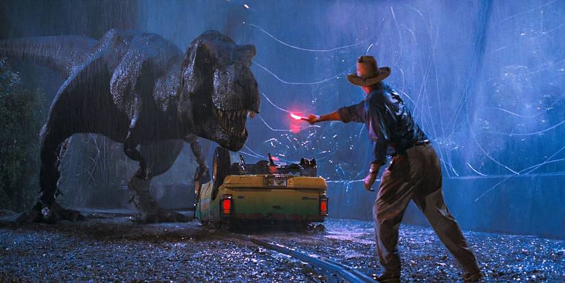 Grant lures a T-Rex away from an overturned jeep using a signal flare in Jurassic Park.
