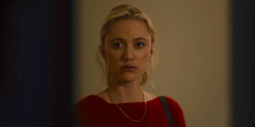 Maika Monroe as Julia looks worried in Watcher.