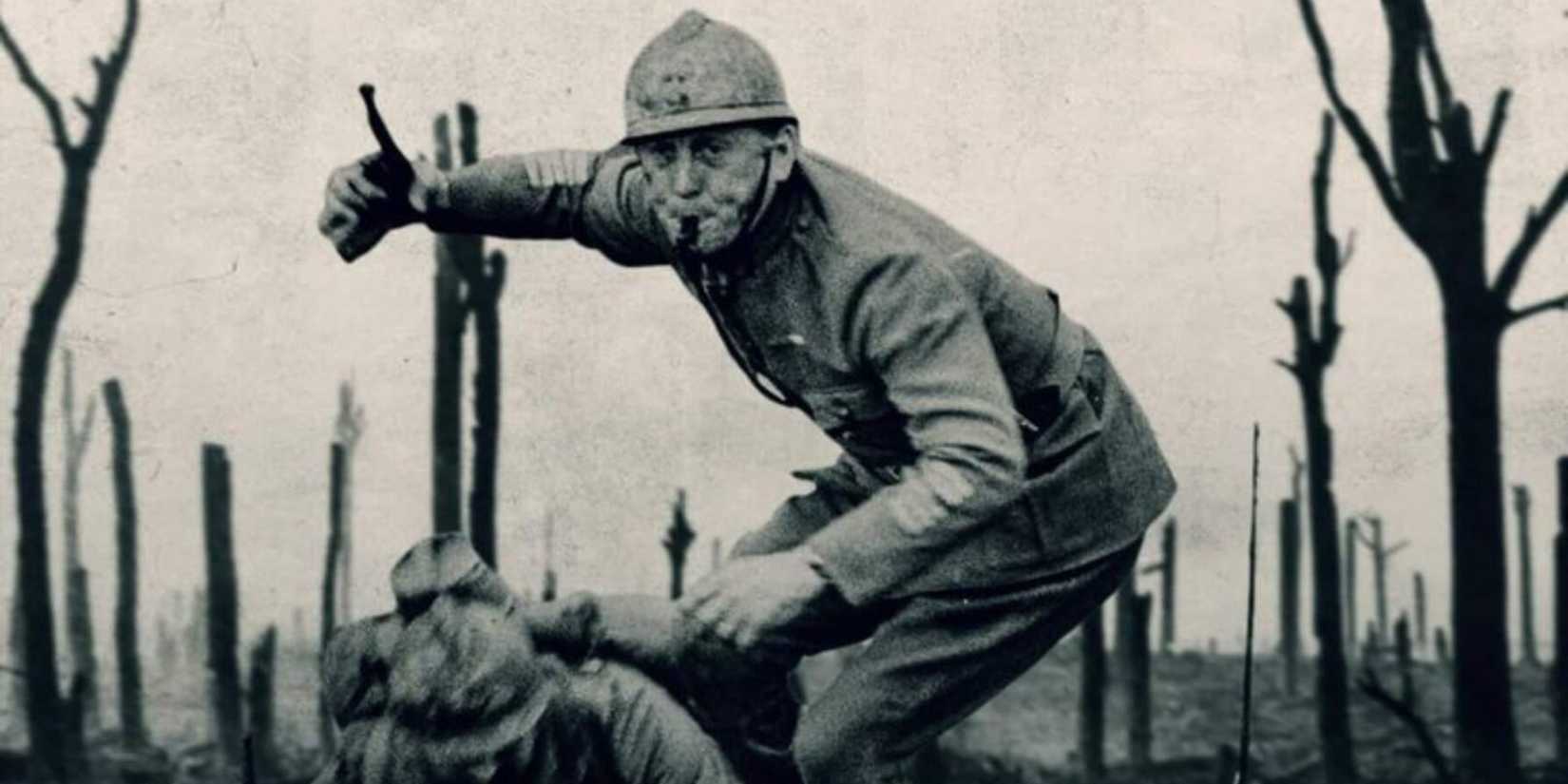 Kirk Douglas holding a gun and blowing a whistle on a poster for Paths of Glory (1958)