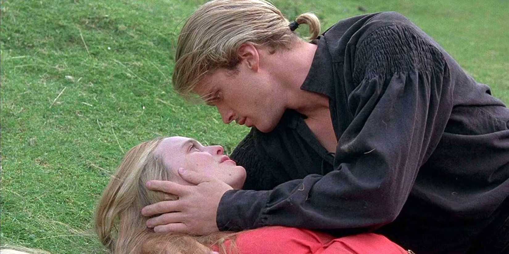 Westley about to kiss Buttercup while laying on the grass in The Princess Bride